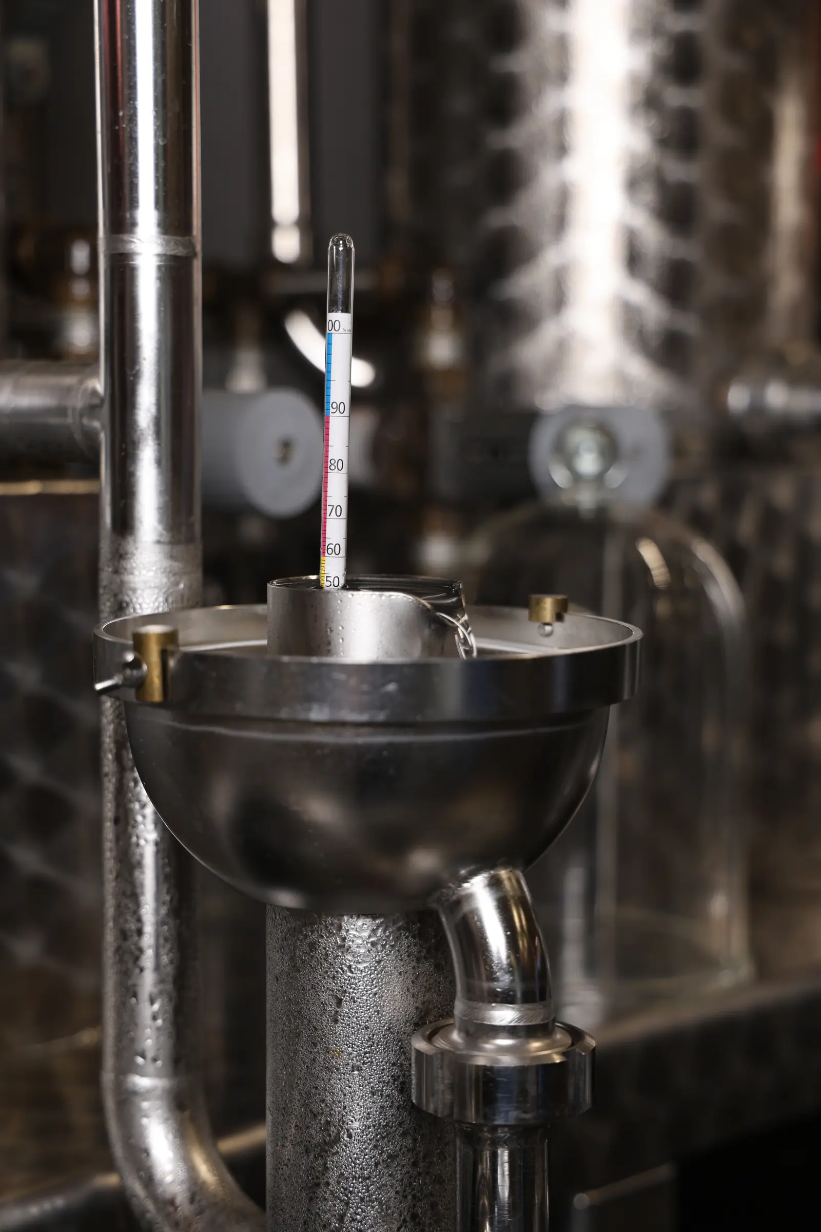 Stainless-steel distillation equipment with a thermometer