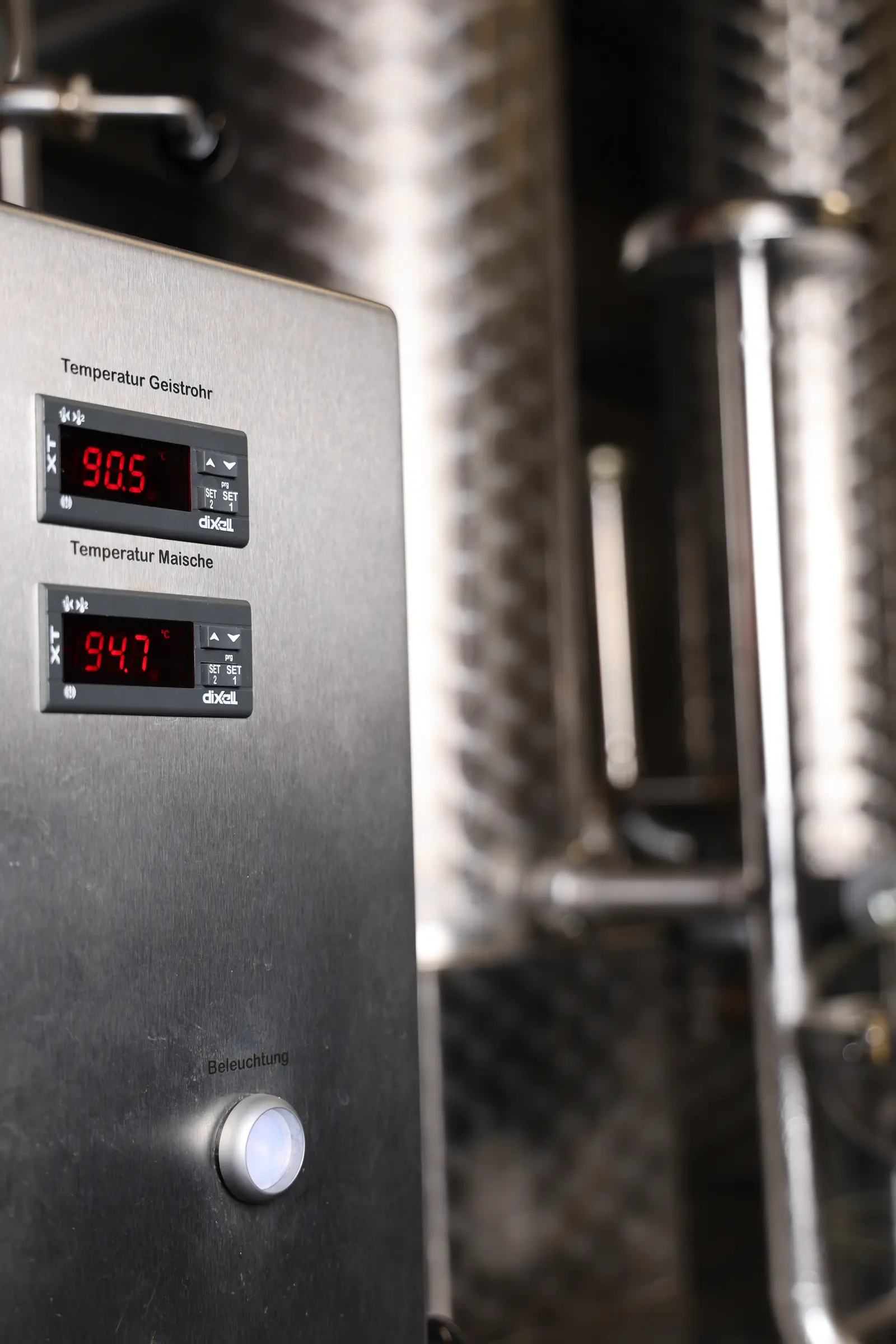 Digital temperature controls on a stainless-steel production unit